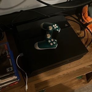 Playstation 4 With all wires!! Also with many games and a controller!!